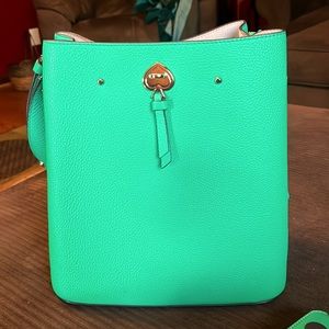Only carried once. Like new. Beautiful Green Kate Spade bag and wallet.